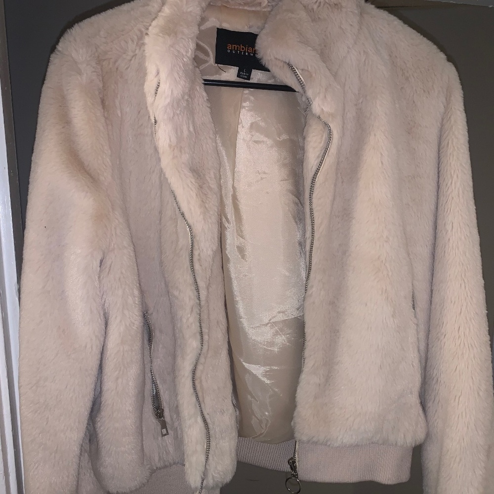 Women’s fuzzy tan coat